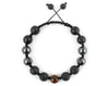 Men's macrame bracelet with hematite, black lava and tiger beads
