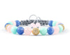 Womens adjustable bracelet with cubic zirconia, aquamarine, rose quartz and mint jade beads