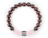 Women’s custom bracelet with natural garnet and rose quartz beads